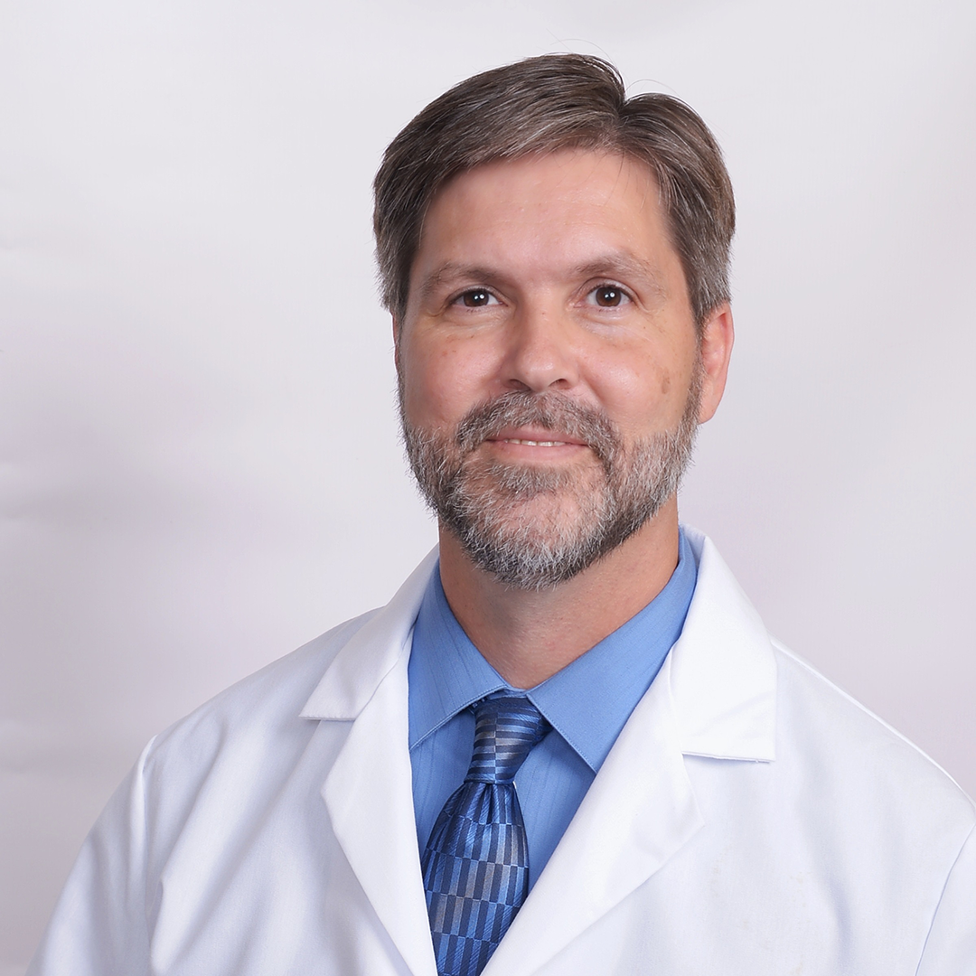 Solomon Conrad, a registered pharmacist, smiles.